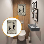 Parodie op toiletbordjes