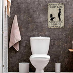 Parodie op toiletbordjes